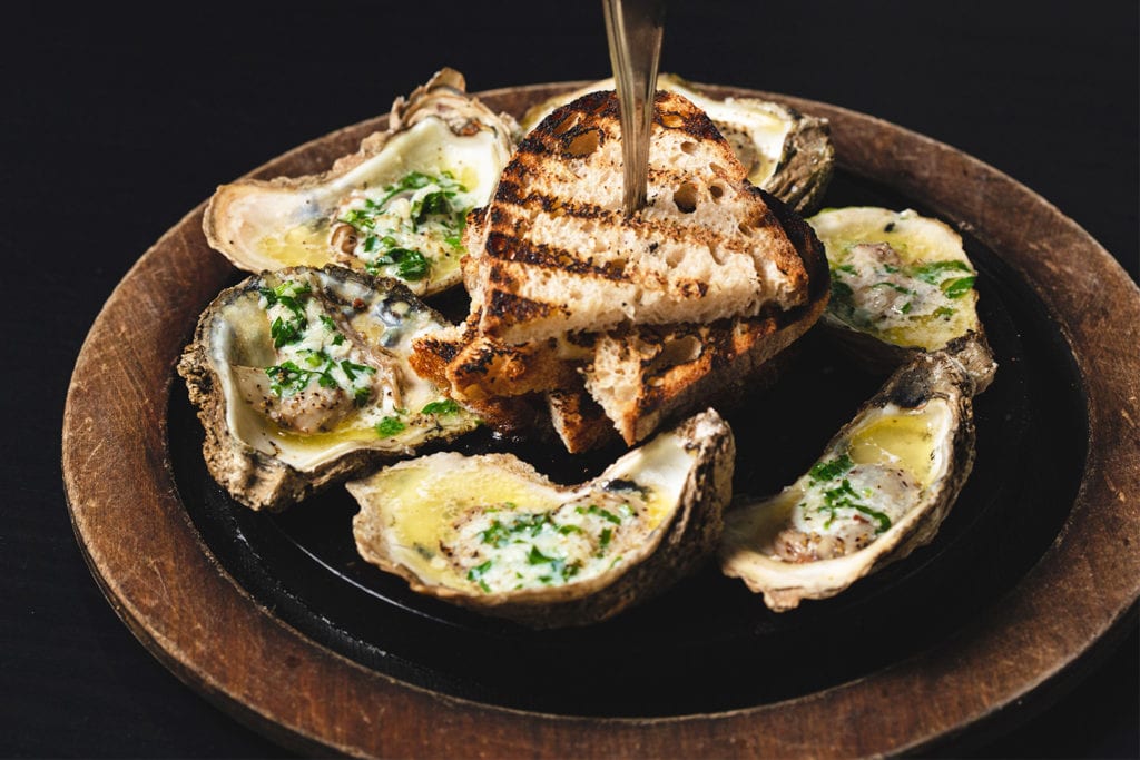 Grilled Chesapeake Oysters and Ciabatta Bread from Boathouse Rotisserie & Raw Bar; Photo by Rich Smith