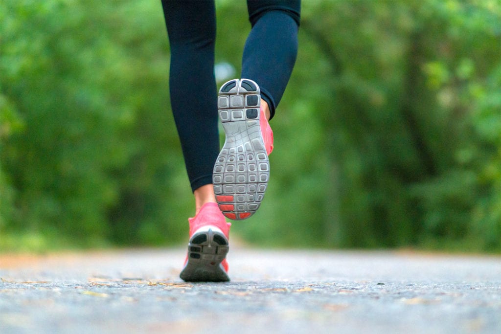 close up of woman's feet as she runs
