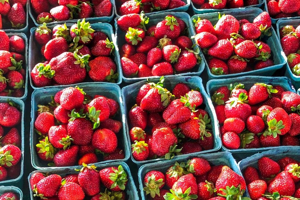 fresh strawberries at a farmers market