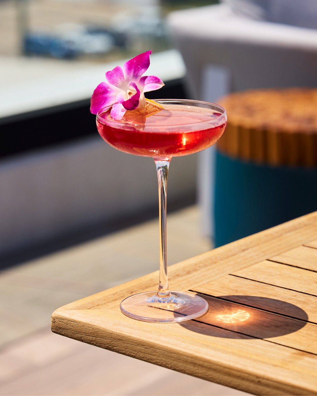 Whether you're craving an after-work happy hour or a night out with friends, @stratusrooftop.chatt is sure to delight. 🍸 This rooftop lounge offers sweeping skyline views and craft cocktails, like this drink, Ride the Currant, made with gin, crème de cassis, and peach bitters and garnished with an edible orchid.
