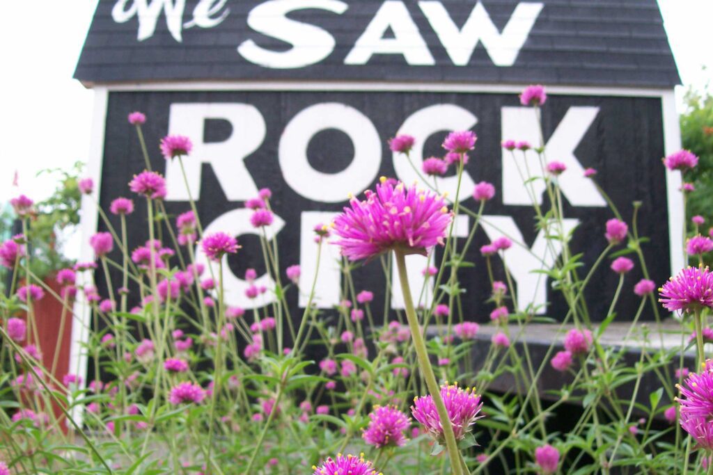 Flowers in front of See Rock City barn