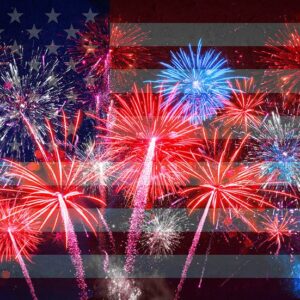 Colorful fireworks in red, white, and blue burst against a faded American flag background.