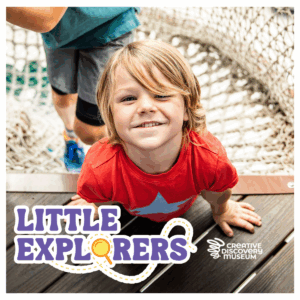 Little boy smiling at the camera.