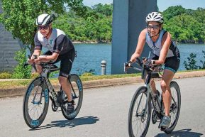 Couple Biking to train for IRONman race