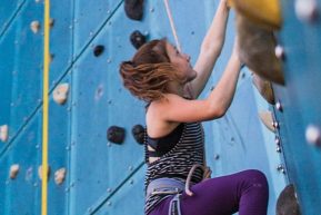Woman rock climbing at High Point